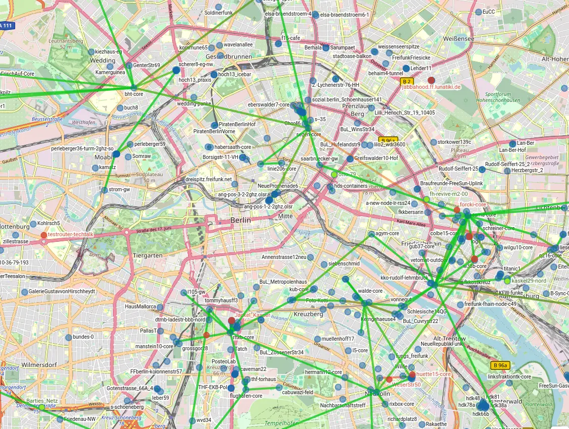 You can see a map of Berlin. There are lots of little dots on the map. Most of them are blue, some are red. There are green lines between some of the dots.
